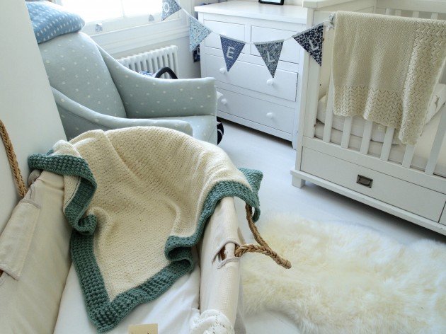 Cashmere baby blanket in white nursery White baby nursery